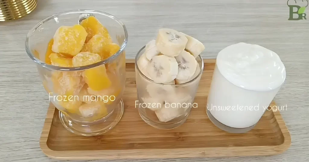 frozen mango, frozen banana, unsweetened yogurt